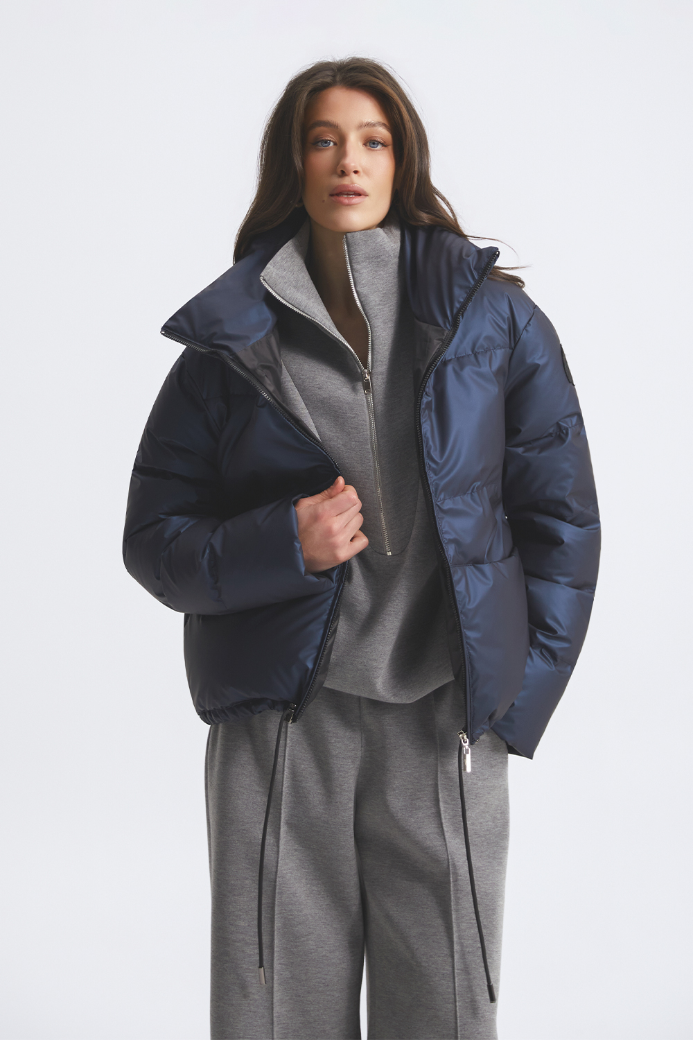 Пухова куртка темно-бірюзового кольору