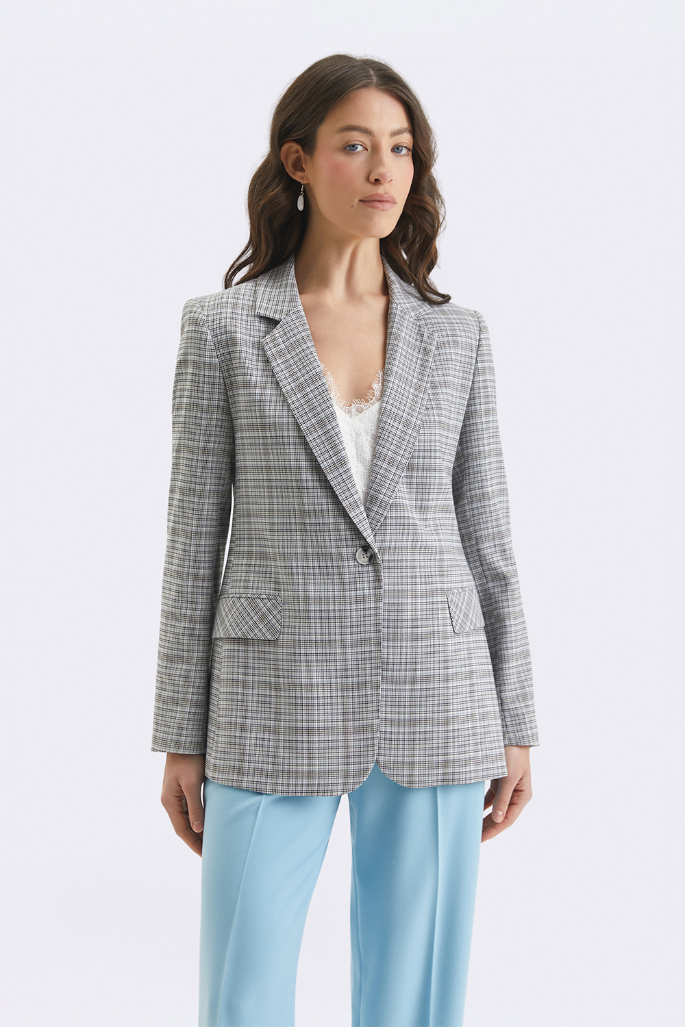 Жакет у сіро-блакитну клітку
