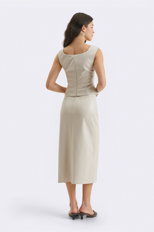 Вид ззаду комплекту з топом та спідницею від Natali Bolgar