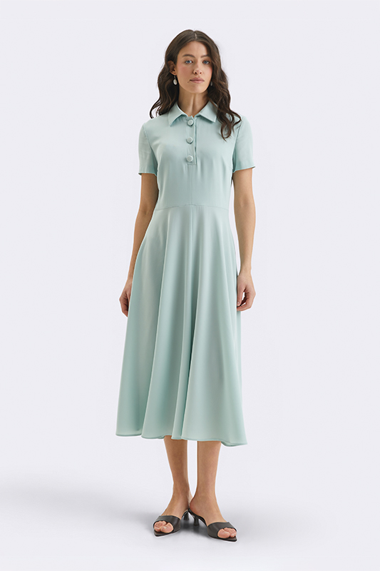 М'ятна сукня-міді з коміром поло від Natali Bolgar
