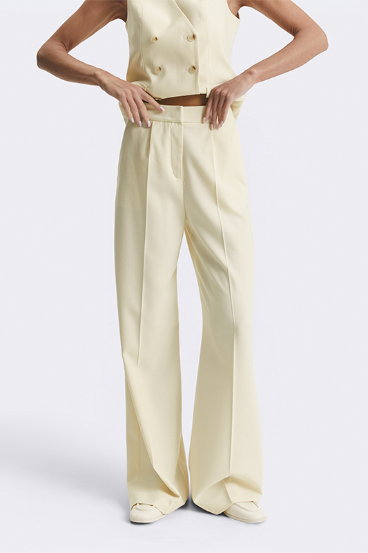 Стильні широкі штани кремового кольору від Natali Bolgar