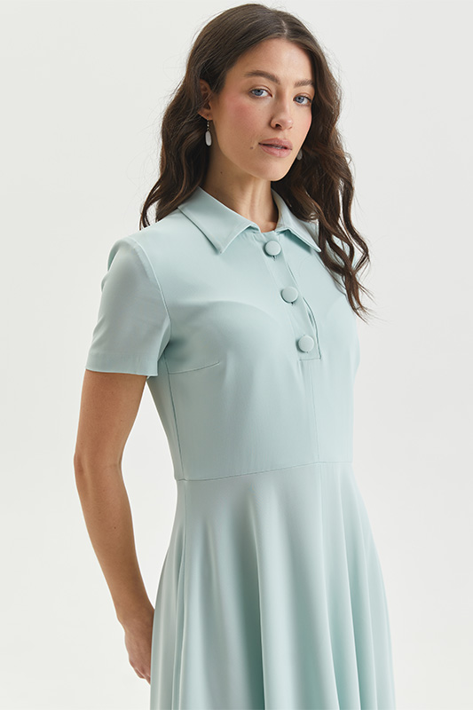 Жіноча пастельна сукня від Natali Bolgar у ніжному м'ятному відтінку з короткими рукавами – ідеальний образ на весну.