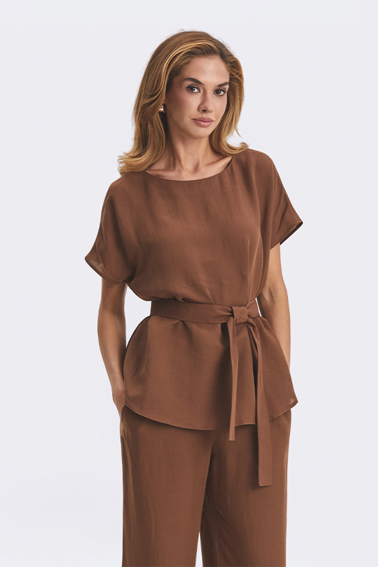 Women's brown loose-fit Natali Bolgar blouse with a belt, a stylish look with trousers for elegant comfort.