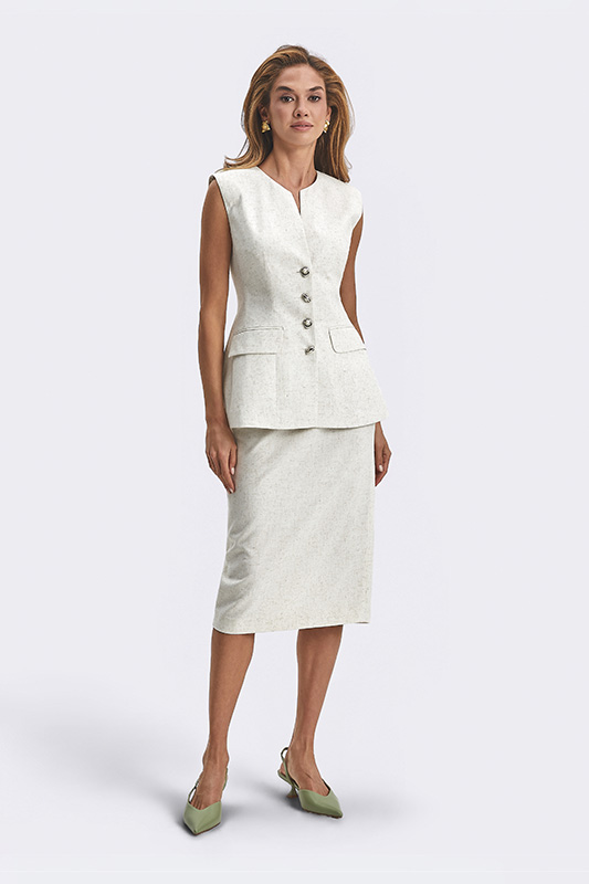 An elegant spring look from Natali Bolgar: a light midi skirt and a sleeveless top. A refined business style in a cream shade.