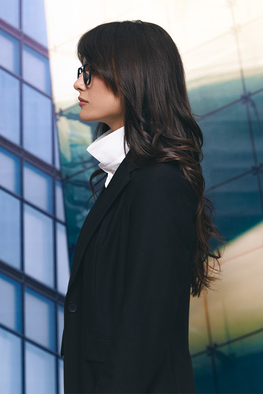 A classic black women's blazer by Natali Bolgar, perfect for office style and a professional look.