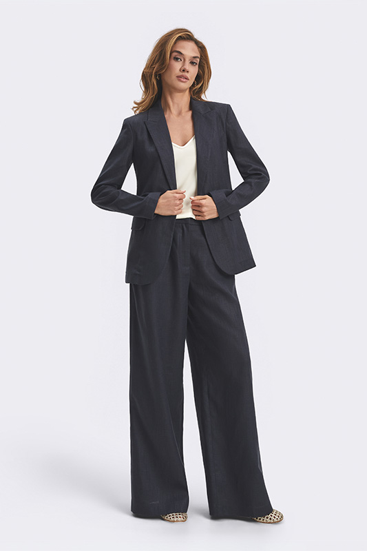 An elegant Natali Bolgar women's blazer with wide-leg trousers in dark gray – a stylish look for the office or business meetings.