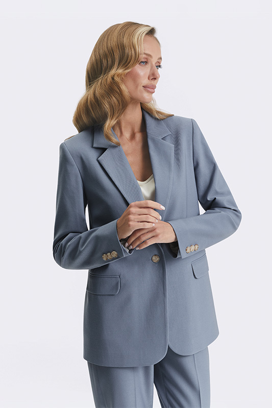 Blue Natali Bolgar women's jacket, an elegant spring look with a cream top and straight-cut trousers for a stylish office.
