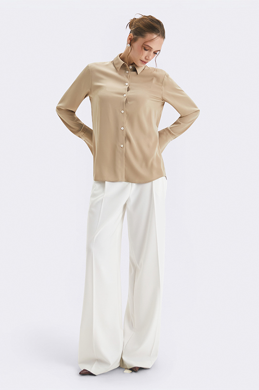 Молочні штани-палаццо з бежевою блузою від Natali Bolgar