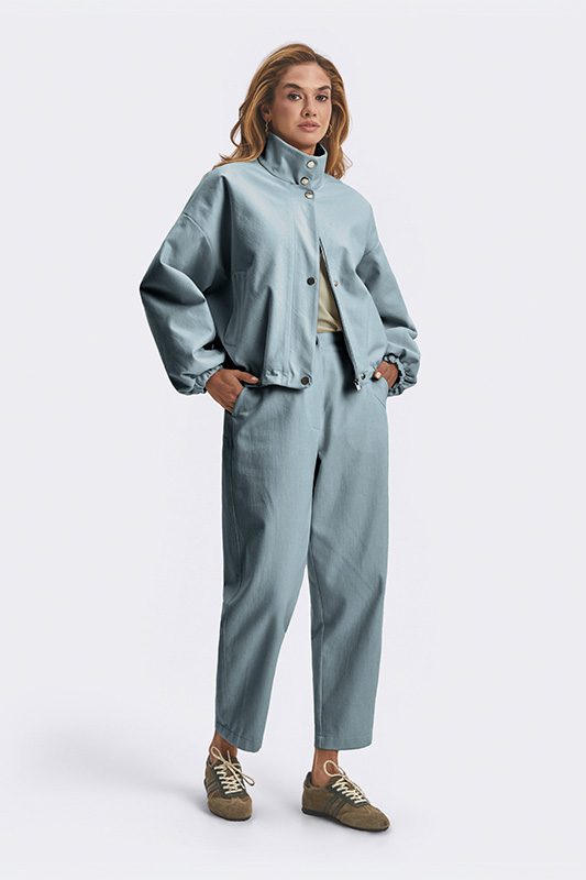 A stylish everyday Natali Bolgar look: a pastel light-blue women's jacket and trousers for a comfortable mood.