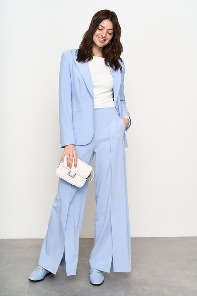 Блакитні штани кльош із розрізами  – Natali Bolgar