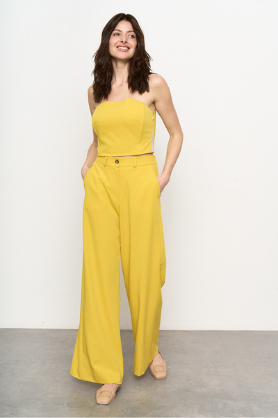 Штани палаццо жовтого кольору  – Natali Bolgar